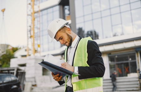 Young man analyzing project building